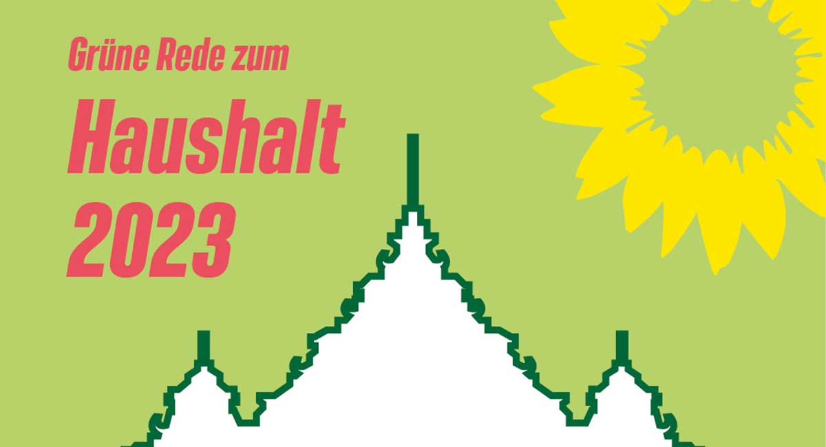 Headline „Grüne Rede zum Haushalt 2023“ mit Silhouette vom Paderborner Rathaus und Sonnenblumenlogo auf grünem Hintergrund.